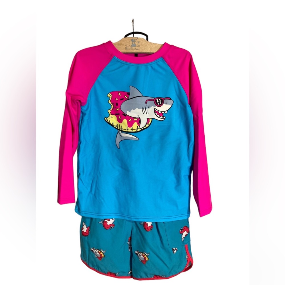 Sovereign Code Rash Guard and swim trunks